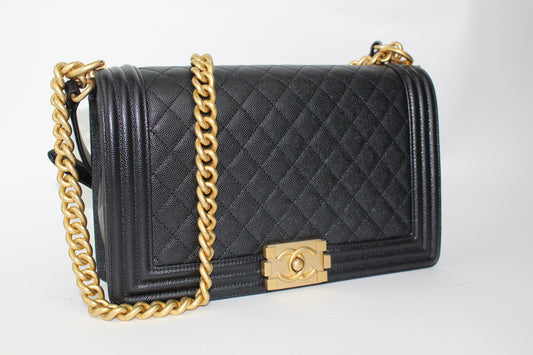 CHANEL NEW MEDIUM CAVIAR BOY BAG