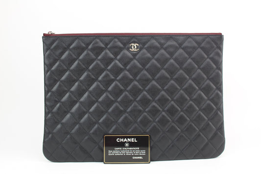 Chanel Large O Case Quilted Caviar Clutch