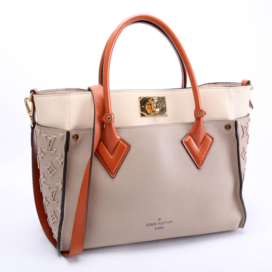 Louis Vuitton On My Side MM Calfskin Taupe