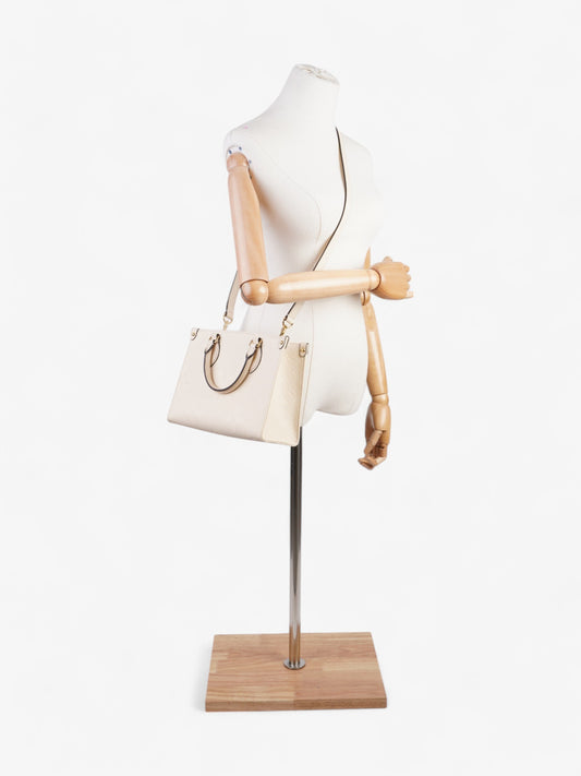 Louis Vuitton On the Go Creme Empreinte Leather PM