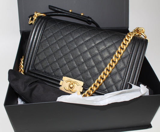 CHANEL NEW MEDIUM CAVIAR BOY BAG