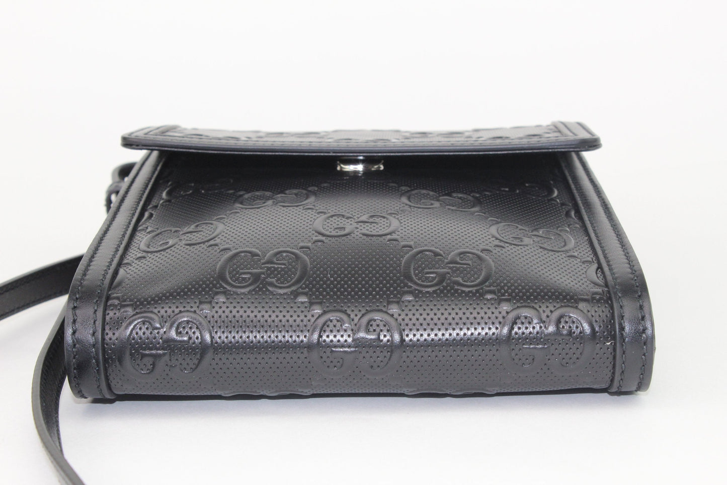 Gucci GG Embossed Messenger Bag