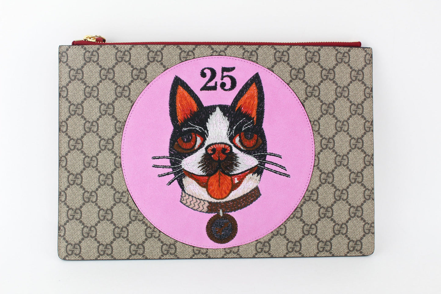 GUCCI GG SUPREME POUCH WITH BOSCO PATCH