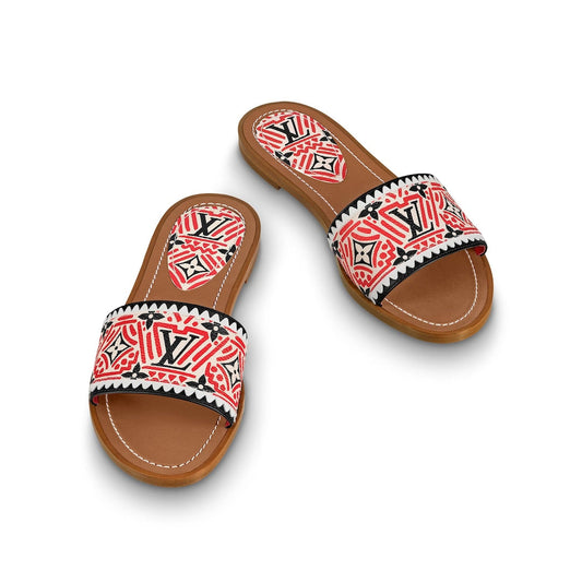 LOUIS VUITTON CRAFTY LOCK IT FLAT MULE